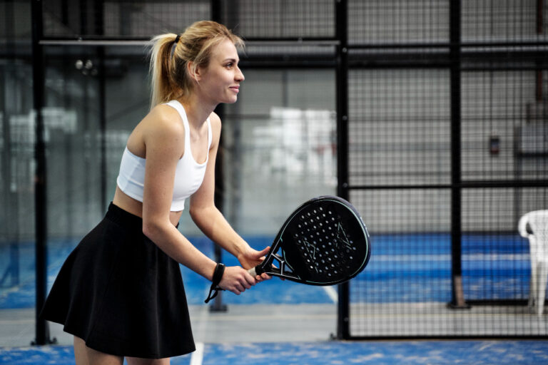 woman-playing-paddle-tennis-medium-shot